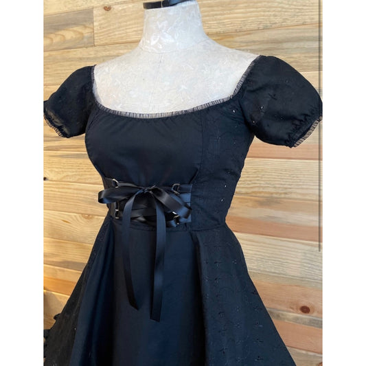 The Cotton Eyelet Tori Barmaid Dress in Black